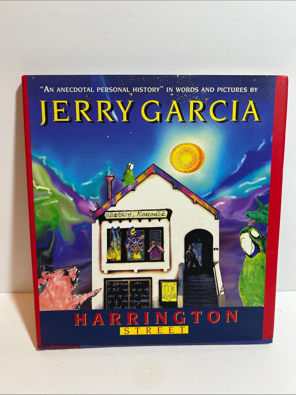 J. Garcia Harrington Street Art Hardcover Book - Blue, Red & Yellow Cover